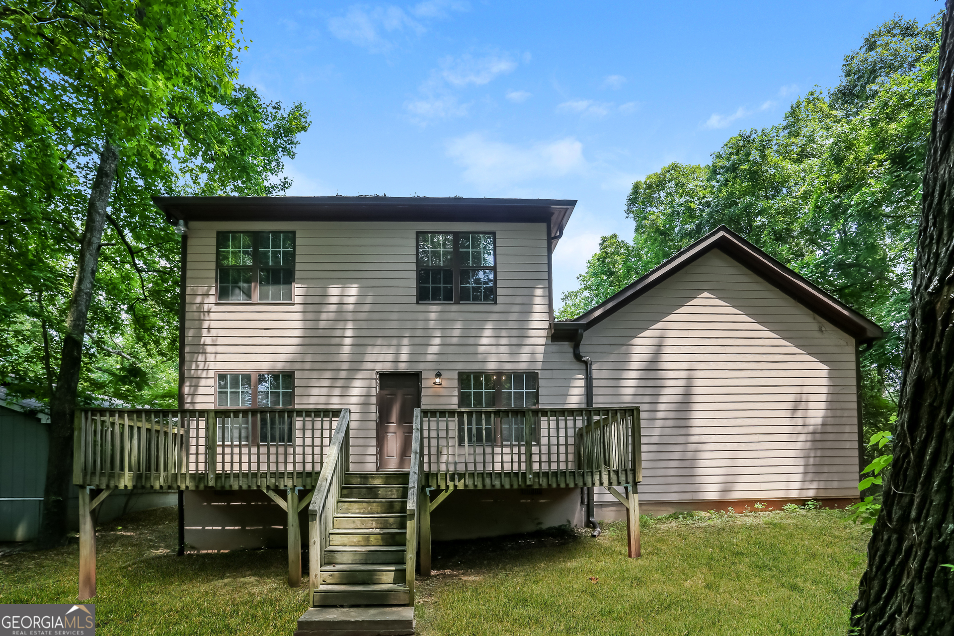 2041 Pryor Road Southwest Atlanta, GA 30315 - Photo 15 of 17 a view of a house with a yard