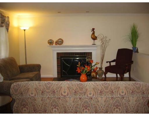 6 Brabrook Road Acton, MA 01720 - Photo 3 of 14 a bedroom with furniture and a fireplace