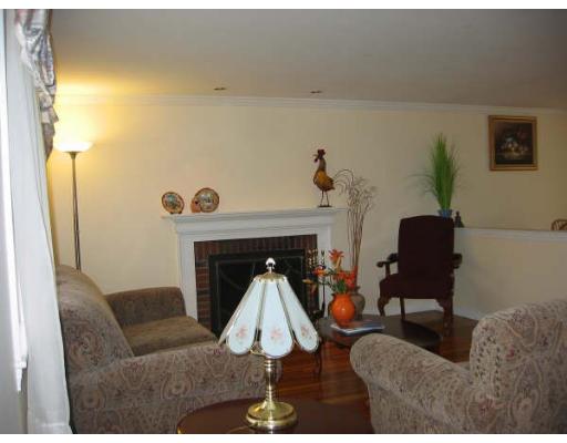 6 Brabrook Road Acton, MA 01720 - Photo 4 of 14 a living room with furniture and a fireplace
