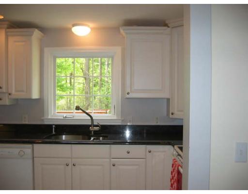6 Brabrook Road Acton, MA 01720 - Photo 6 of 14 a kitchen with a sink and cabinets