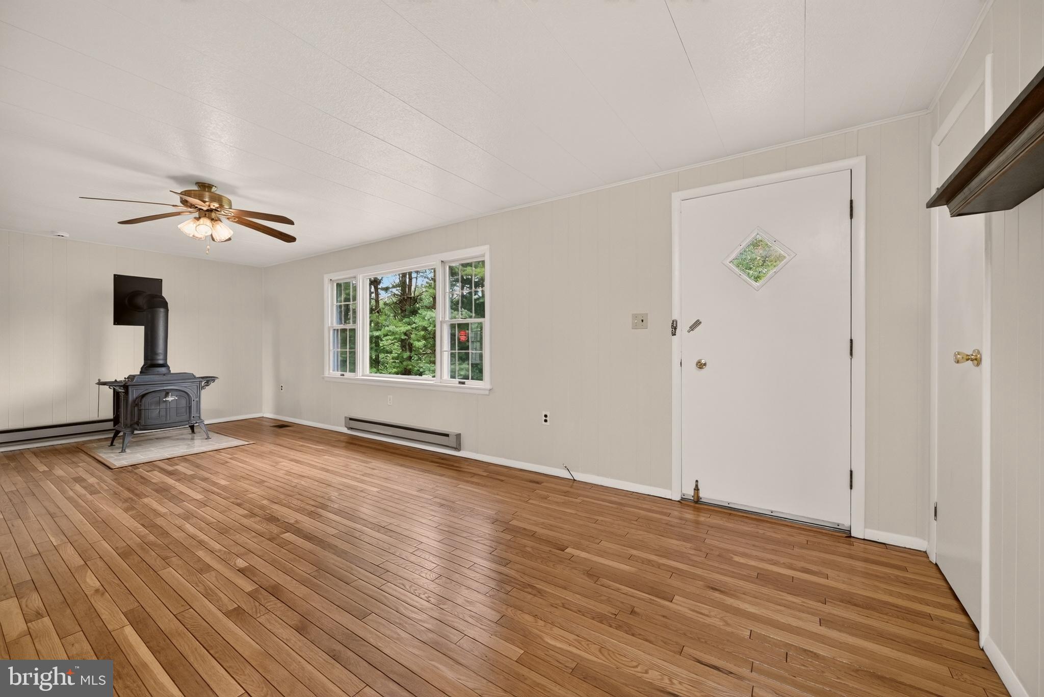 13835 Howard Road Dayton, MD 21036 - Photo 11 of 43 Living room with refinished hardwood floors