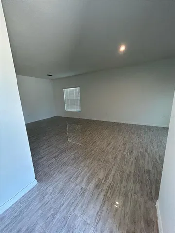 a kitchen with stainless steel appliances granite countertop a refrigerator sink and cabinets