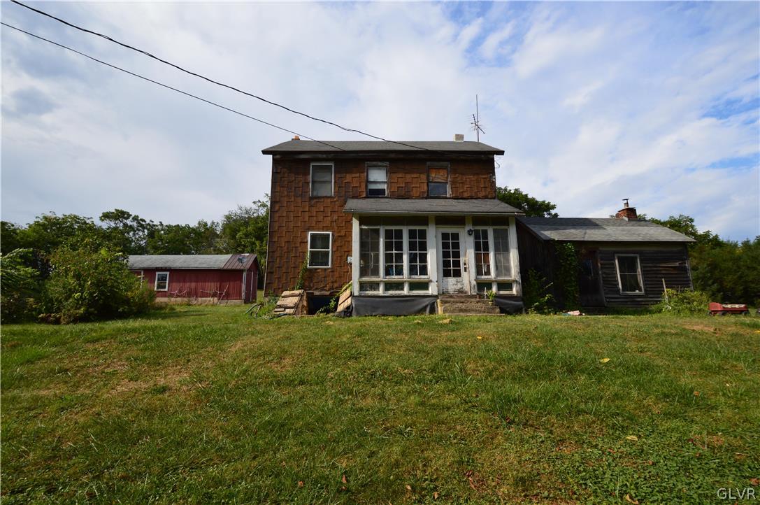 552 Bauer Road Bath, PA 18014 - Photo 1 of 48 a front view of a house with a garden
