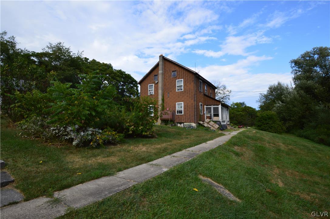 552 Bauer Road Bath, PA 18014 - Photo 14 of 48 a view of a house with yard and a garden