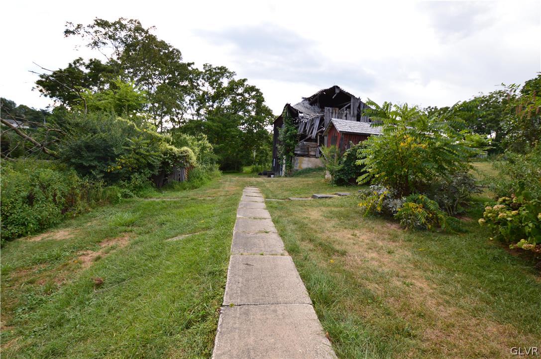 552 Bauer Road Bath, PA 18014 - Photo 20 of 48 a pathway of a house with a yard