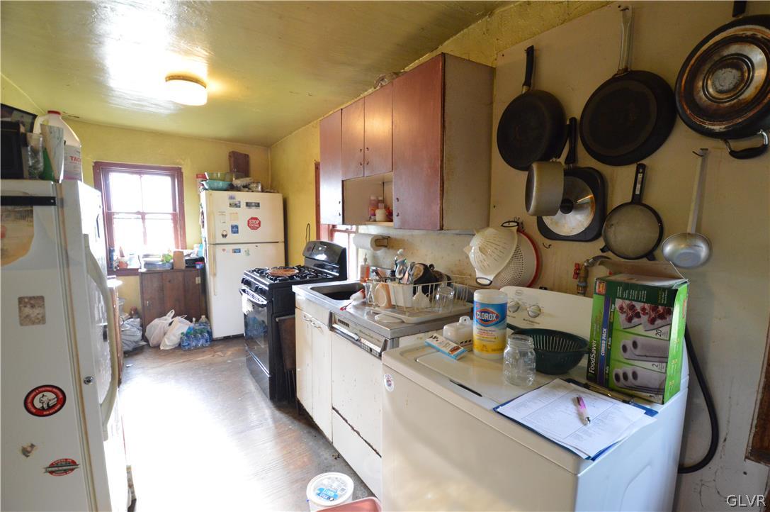 552 Bauer Road Bath, PA 18014 - Photo 43 of 48 a kitchen with a refrigerator and a stove