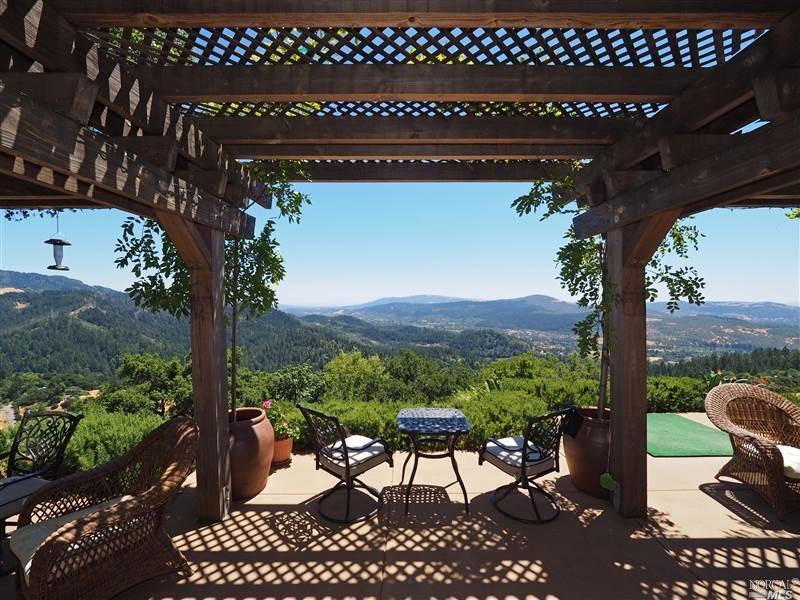 5210 Corrick Road Santa Rosa, CA 95409 - Photo 1 of 1 a view of a balcony with chairs and a table