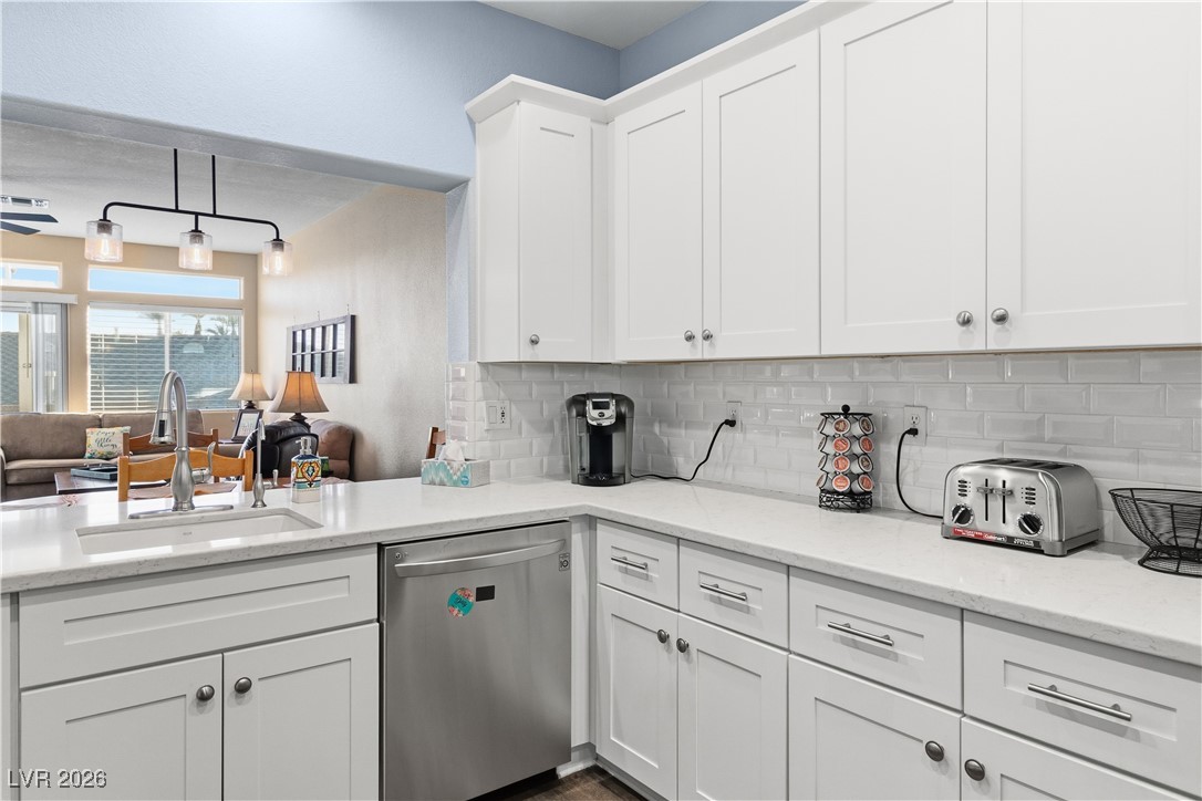 3350 Pheasant Canyon Way, Unit 1008 Laughlin, NV 89029 - Photo 79 of 80 Kitchen with open floor plan, stainless steel dishwasher%
