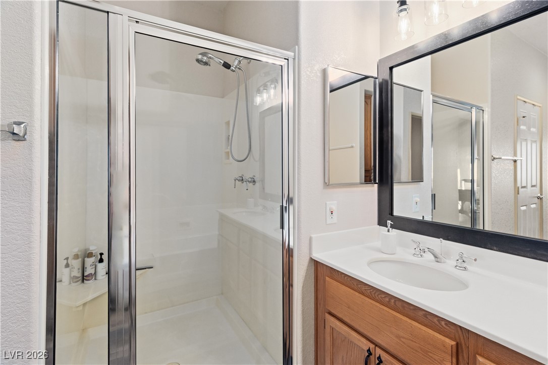 3350 Pheasant Canyon Way, Unit 1008 Laughlin, NV 89029 - Photo 26 of 80 Full bath featuring vanity and a shower stall