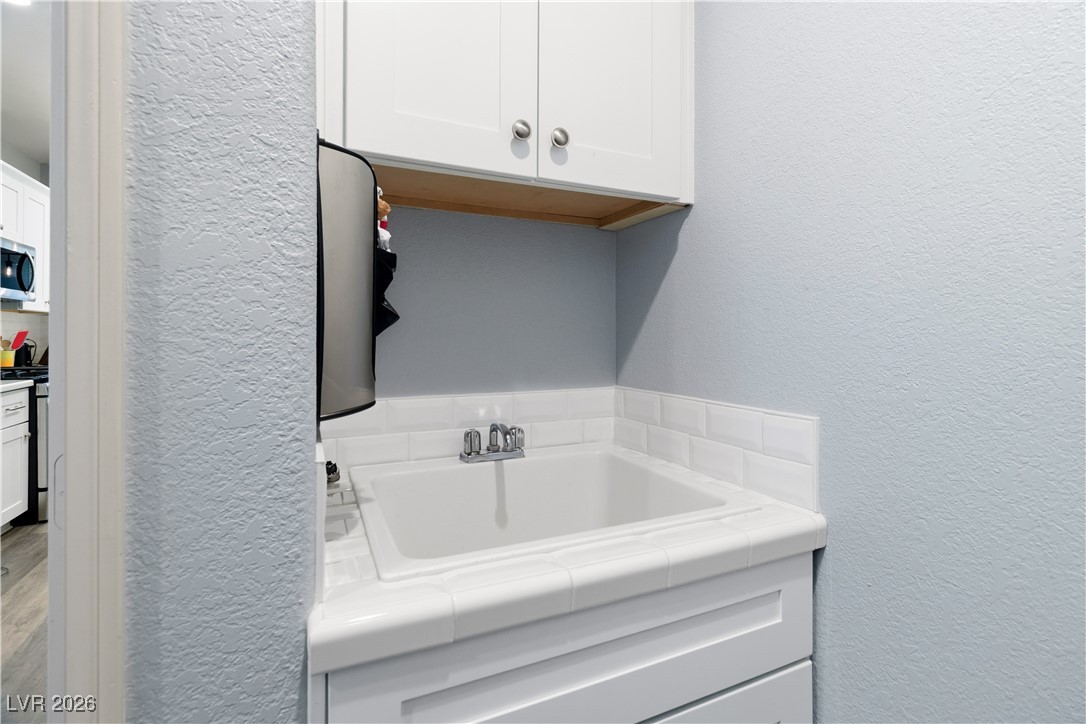 3350 Pheasant Canyon Way, Unit 1008 Laughlin, NV 89029 - Photo 34 of 80 Utility sink in Laundry room