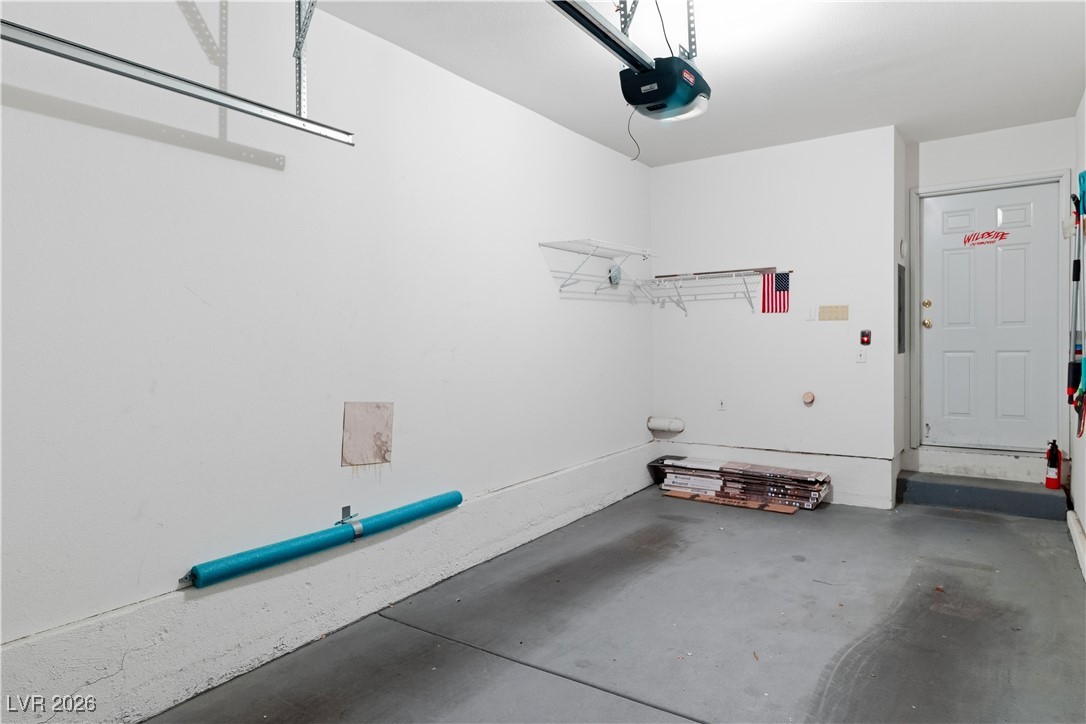 3350 Pheasant Canyon Way, Unit 1008 Laughlin, NV 89029 - Photo 35 of 80 Garage featuring a garage door opener
