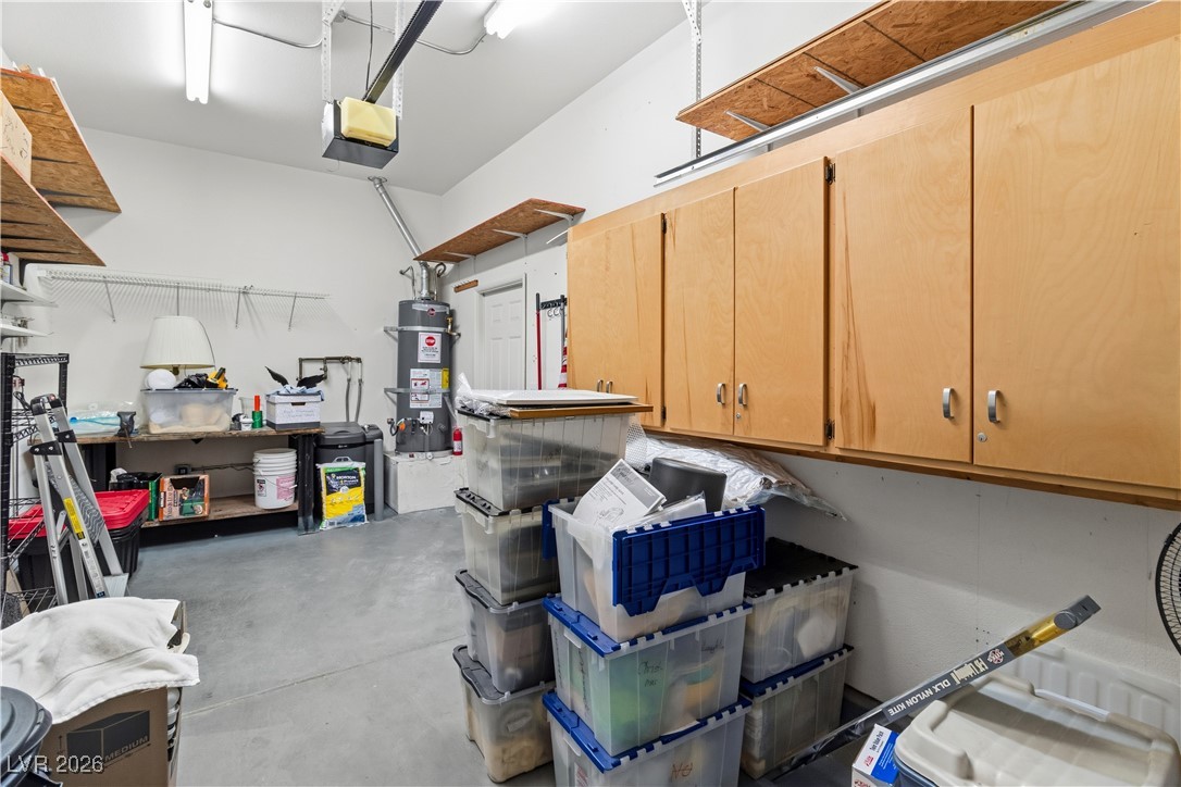 3350 Pheasant Canyon Way, Unit 1008 Laughlin, NV 89029 - Photo 42 of 80 Second Garage featuring water heater and a garage door opener