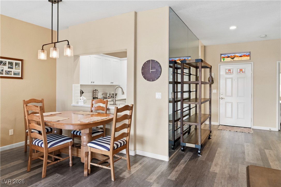 3350 Pheasant Canyon Way, Unit 1008 Laughlin, NV 89029 - Photo 6 of 80 Beautiful dining area with baseboards and luxury vinyl plank flooring.