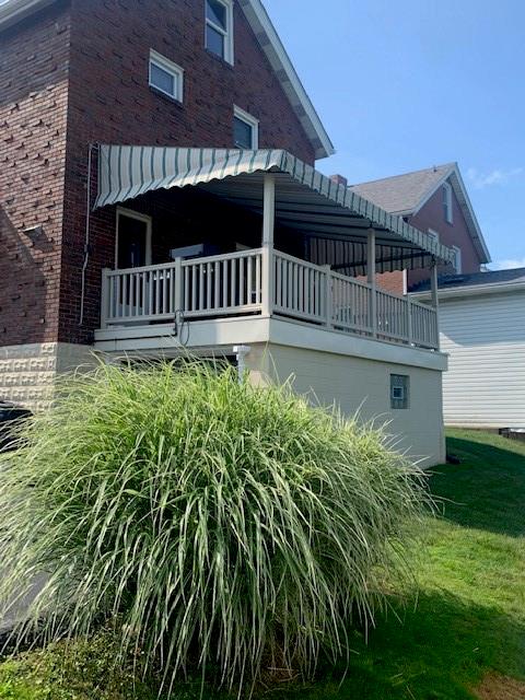 1737 Chester Road Verona, PA 15147 - Photo 22 of 23 a view of a house with backyard and sitting area