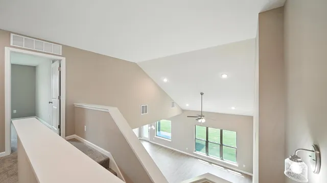 a bathroom with a sink and glass door