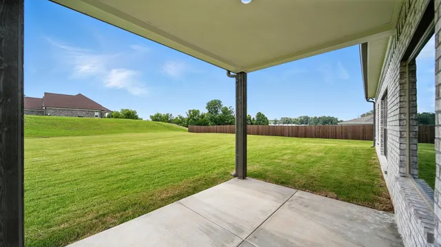 a view of a garden with an outdoor space