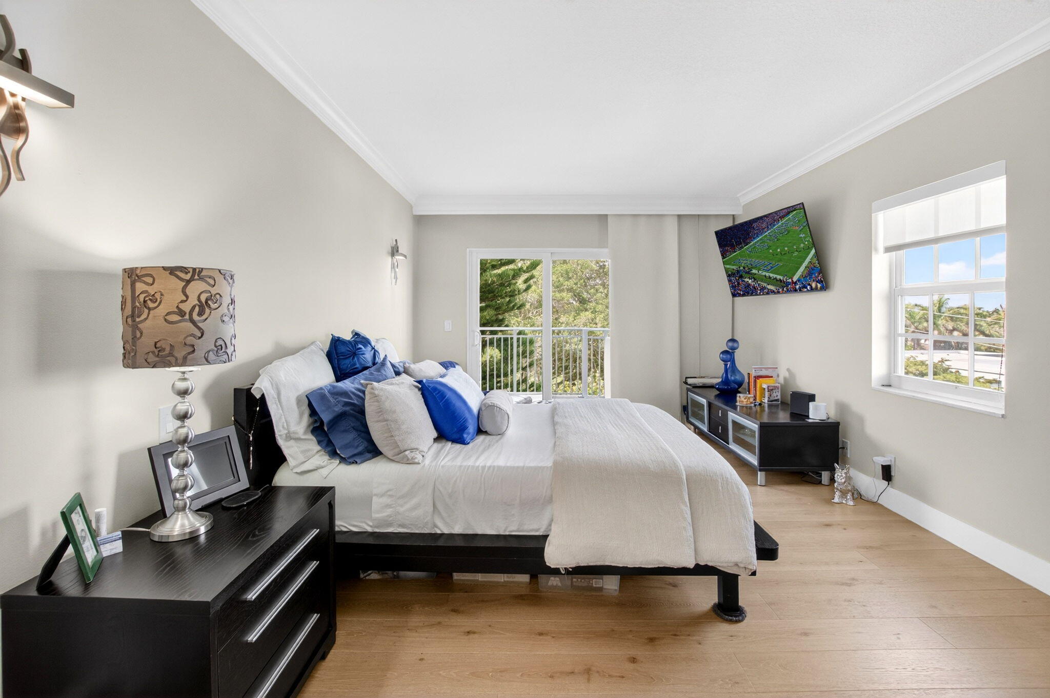 950 De Soto Road, Unit 5A Boca Raton, FL 33432 - Photo 46 of 98 a bedroom with bed and window