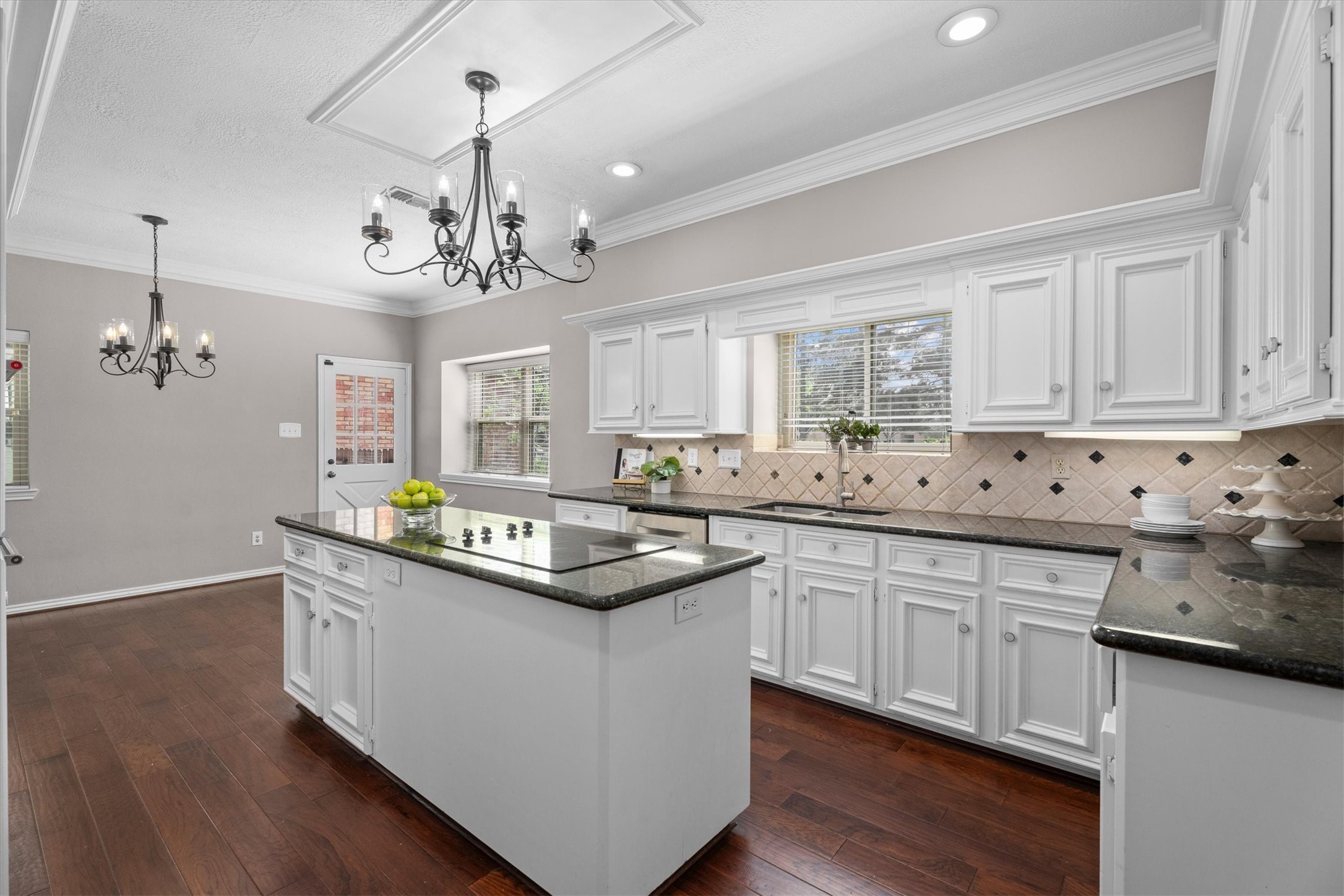 16267 Salmon Lane Spring, TX 77379 - Photo 9 of 48 Gorgeous, large kitchen features white cabinets, granite countertops, and lots of light. Appliances updated in 2021. Windows replaced in 2014.