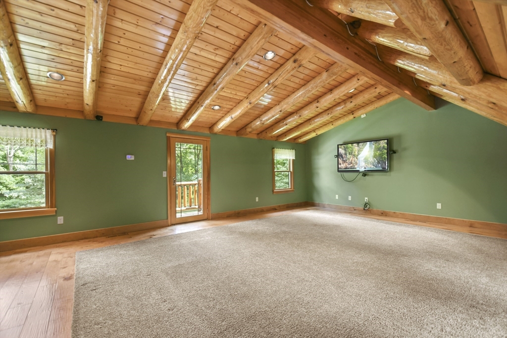 389 Kelly Road Northbridge, MA 01534 - Photo 16 of 40 a view of empty room with a ceiling fan and window