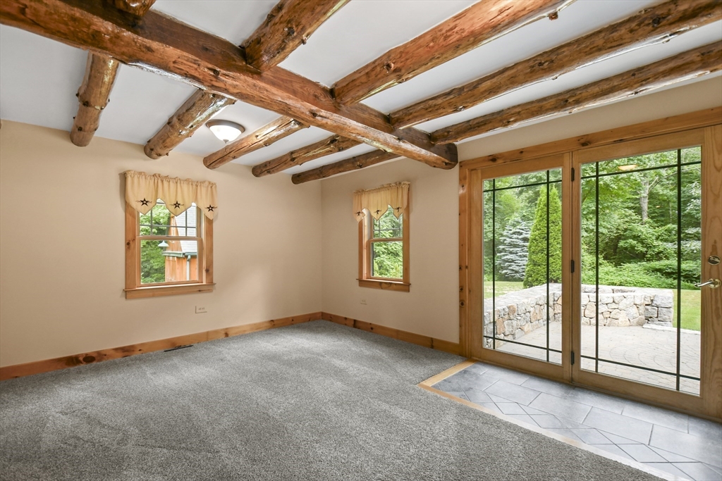 389 Kelly Road Northbridge, MA 01534 - Photo 22 of 40 a view of an empty room with windows