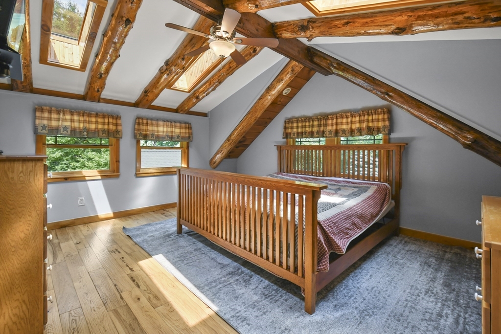 389 Kelly Road Northbridge, MA 01534 - Photo 25 of 40 a view of a porch with wooden floor and fence