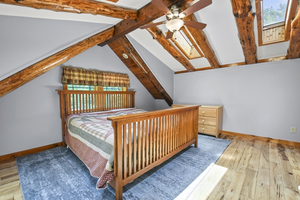 389 Kelly Road Northbridge, MA 01534 - Photo 26 of 40 a view of bedroom with wooden floor