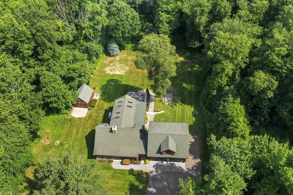 389 Kelly Road Northbridge, MA 01534 - Photo 3 of 40 an aerial view of a house with a yard