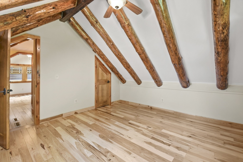 389 Kelly Road Northbridge, MA 01534 - Photo 31 of 40 a view of an empty room and wooden floor