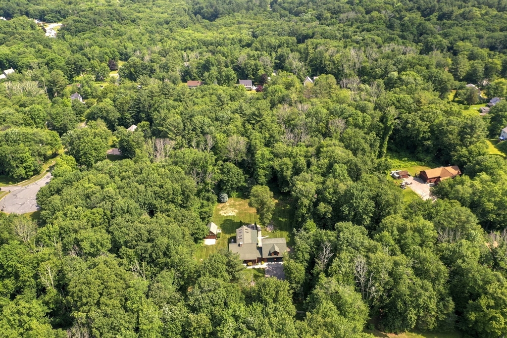 389 Kelly Road Northbridge, MA 01534 - Photo 38 of 40 an aerial view of residential house with outdoor space and trees all around