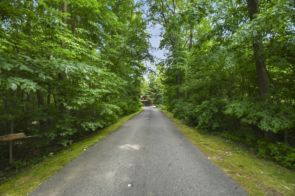 389 Kelly Road Northbridge, MA 01534 - Photo 40 of 40 a view of a street with a yard