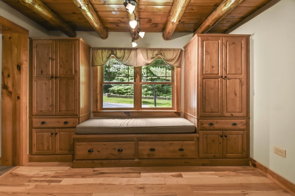 389 Kelly Road Northbridge, MA 01534 - Photo 10 of 40 a view of a room with wooden floor and windows