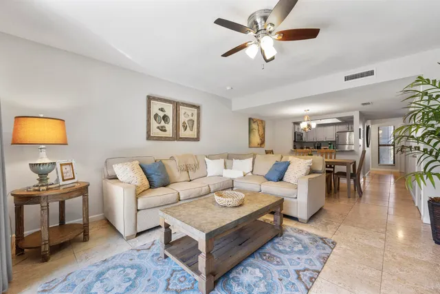 a view of a house with a small yard