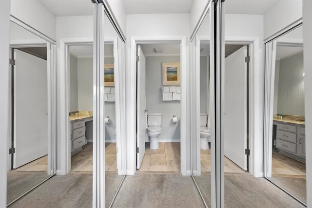 a view of a lake with building in the background