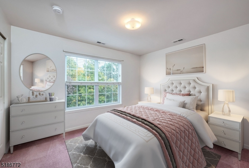 89 Hill Hollow Road Lake Hopatcong, NJ 07849 - Photo 17 of 25 a bedroom with a bed and a large window