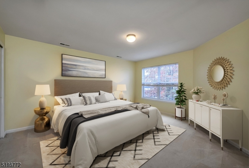 89 Hill Hollow Road Lake Hopatcong, NJ 07849 - Photo 18 of 25 a bedroom with a bed and window