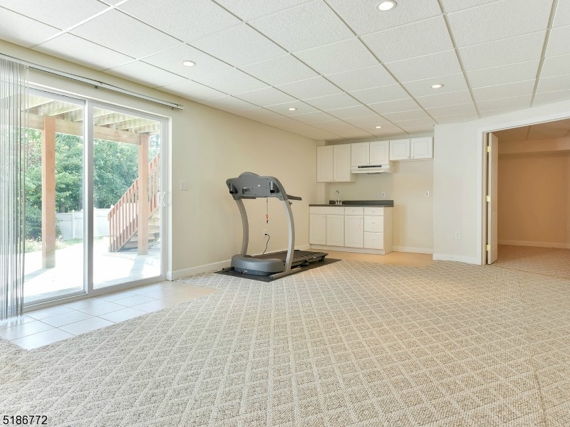 89 Hill Hollow Road Lake Hopatcong, NJ 07849 - Photo 19 of 25 a view of a kitchen with a sink and a window