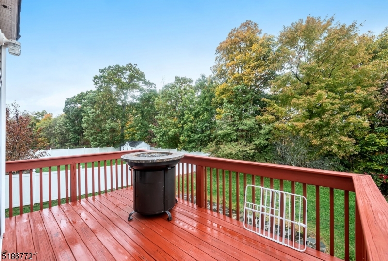 89 Hill Hollow Road Lake Hopatcong, NJ 07849 - Photo 23 of 25 a view of balcony with wooden floor and fence