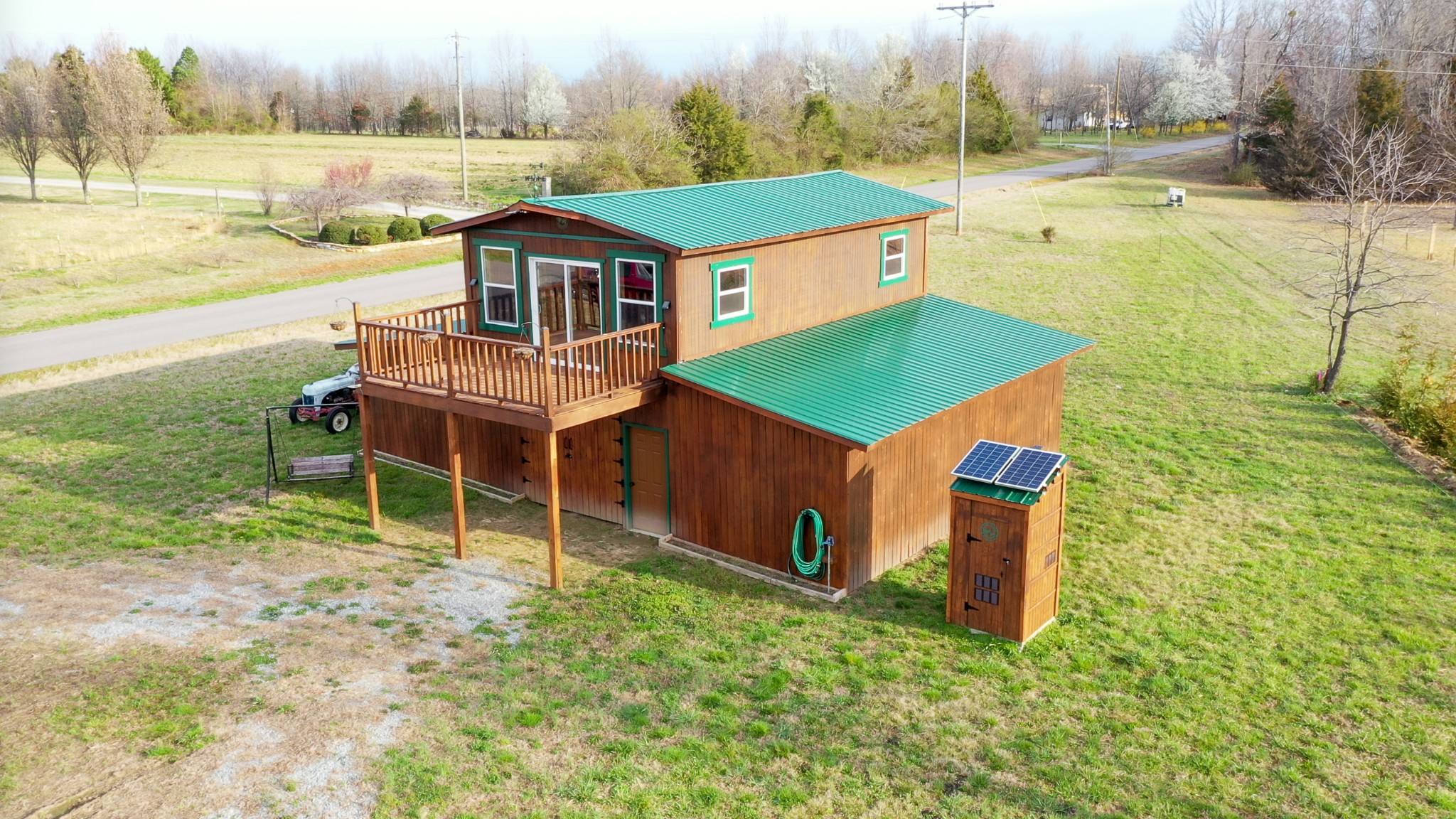 107 Echols Road Elora, TN 37328 - Photo 14 of 50 a view of a house with pool and a yard