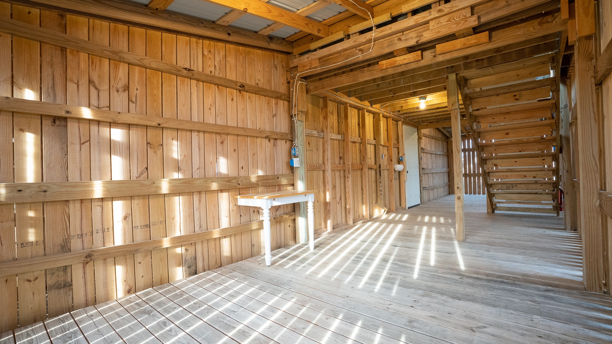 107 Echols Road Elora, TN 37328 - Photo 37 of 50 a bedroom with a bed and a large window