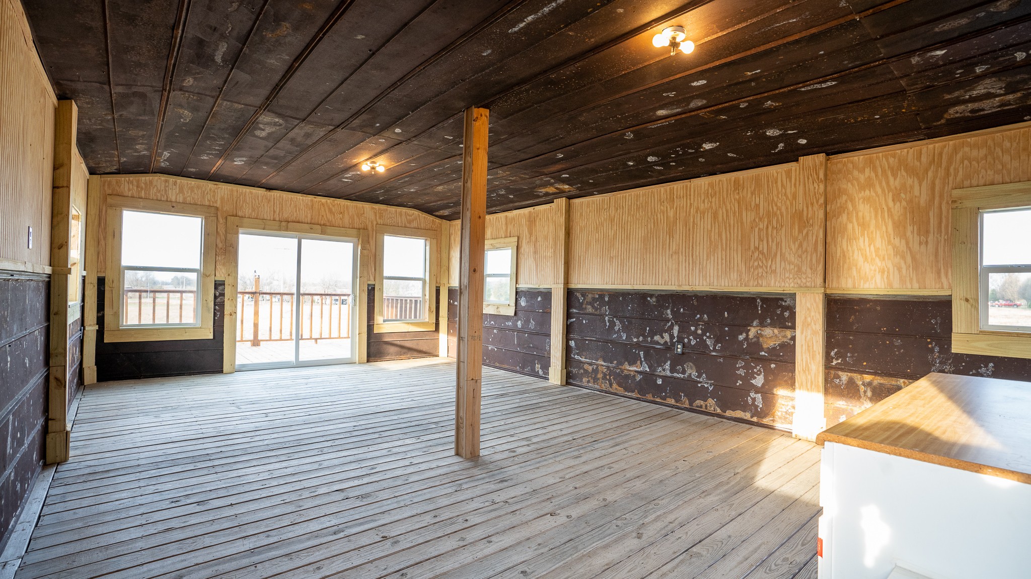 107 Echols Road Elora, TN 37328 - Photo 39 of 50 a view of an empty room with wooden floor and a window