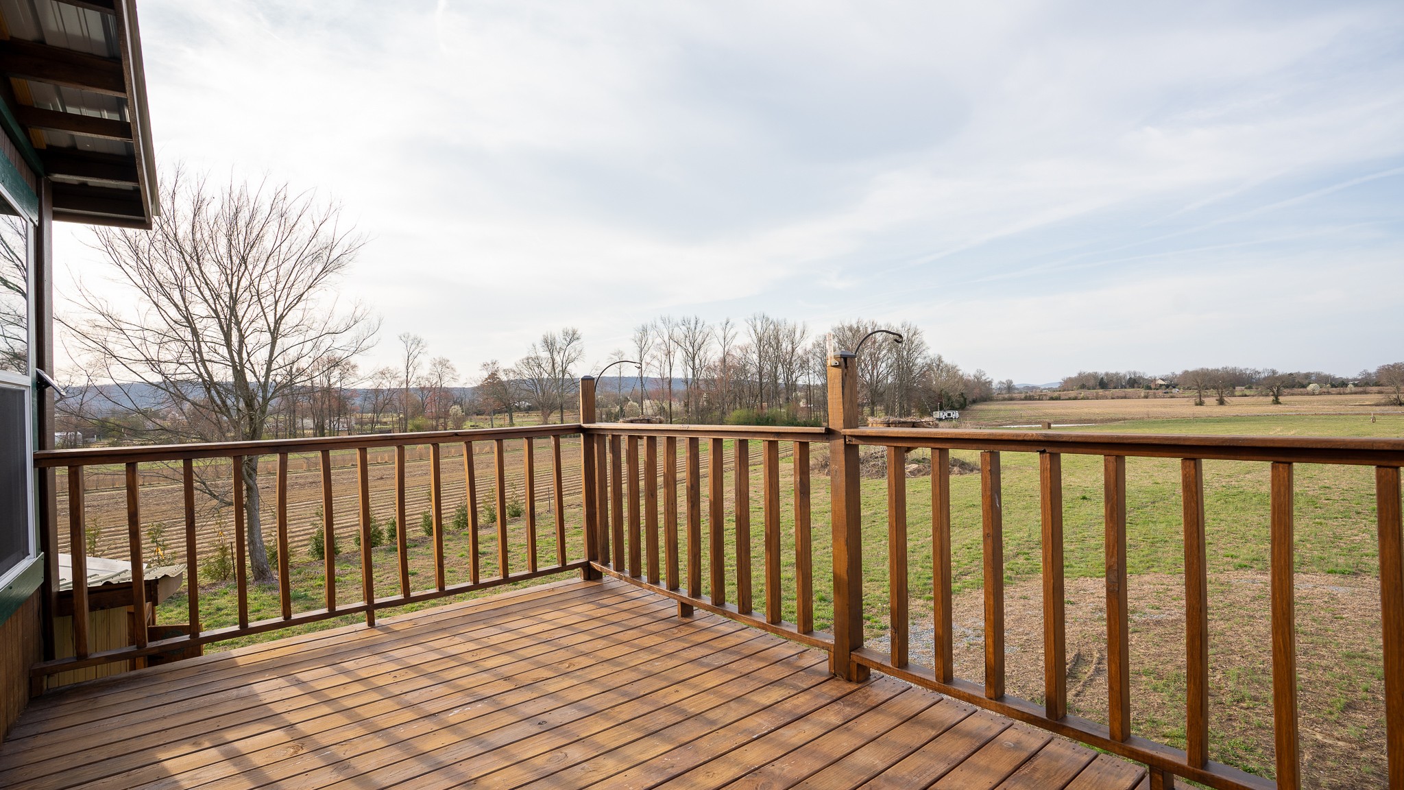 107 Echols Road Elora, TN 37328 - Photo 45 of 50 a balcony with wooden floor and fence