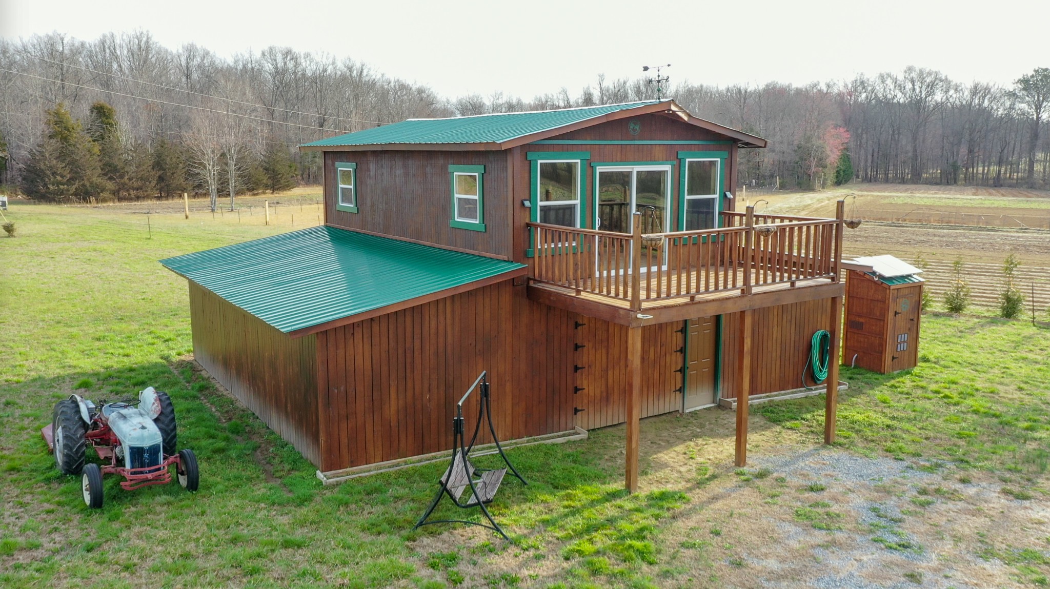 107 Echols Road Elora, TN 37328 - Photo 9 of 50 a view of a house with a backyard and a patio