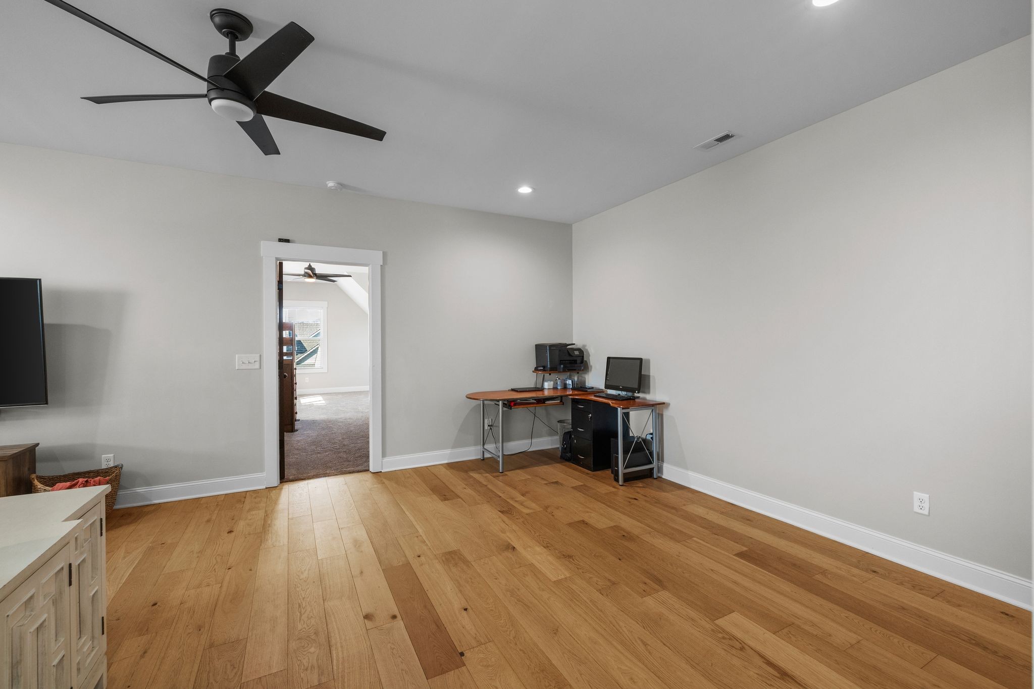 1677 Mc Bride Road Lewisburg, TN 37091 - Photo 21 of 35 a view of a workspace with furniture and a ceiling fan