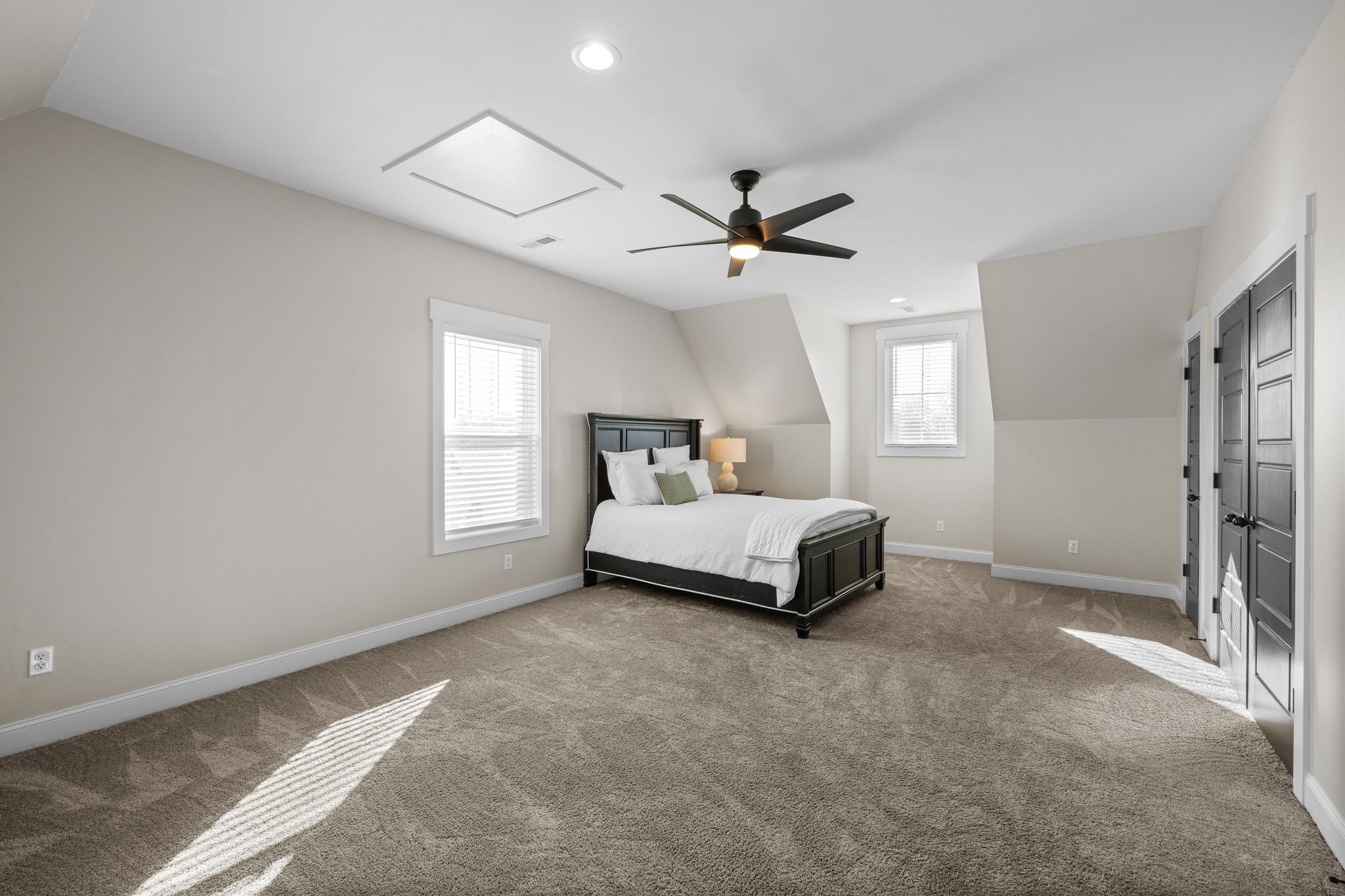 1677 Mc Bride Road Lewisburg, TN 37091 - Photo 23 of 35 a bedroom with a bed a chandelier and a window