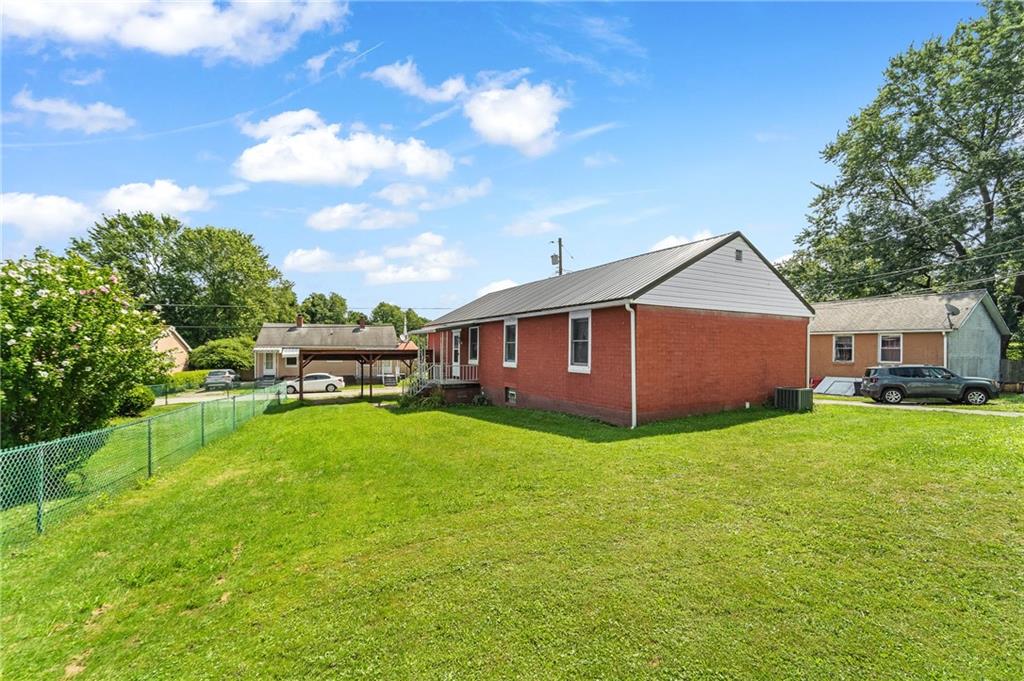 7 A Street Clarksville, PA 15322 - Photo 19 of 27 a view of a house with backyard
