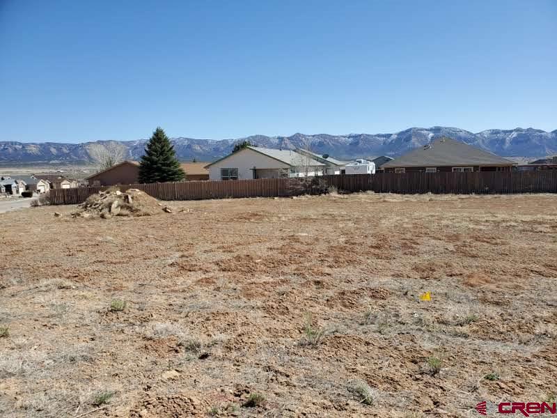 617 East 7th Street Cortez, CO 81321 - Photo 4 of 5 a view of lake and mountain