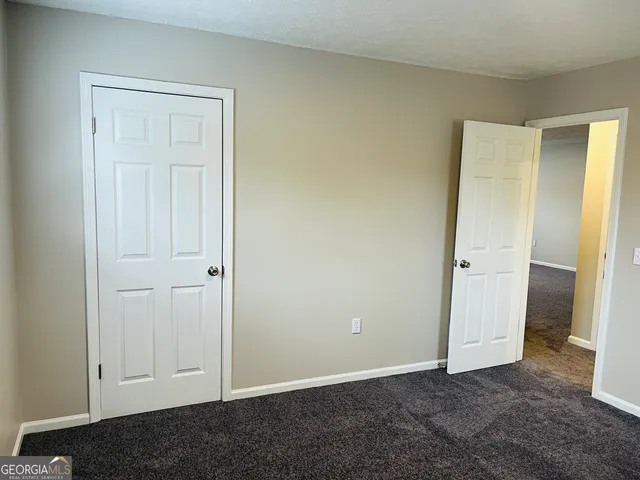 an empty room with closet