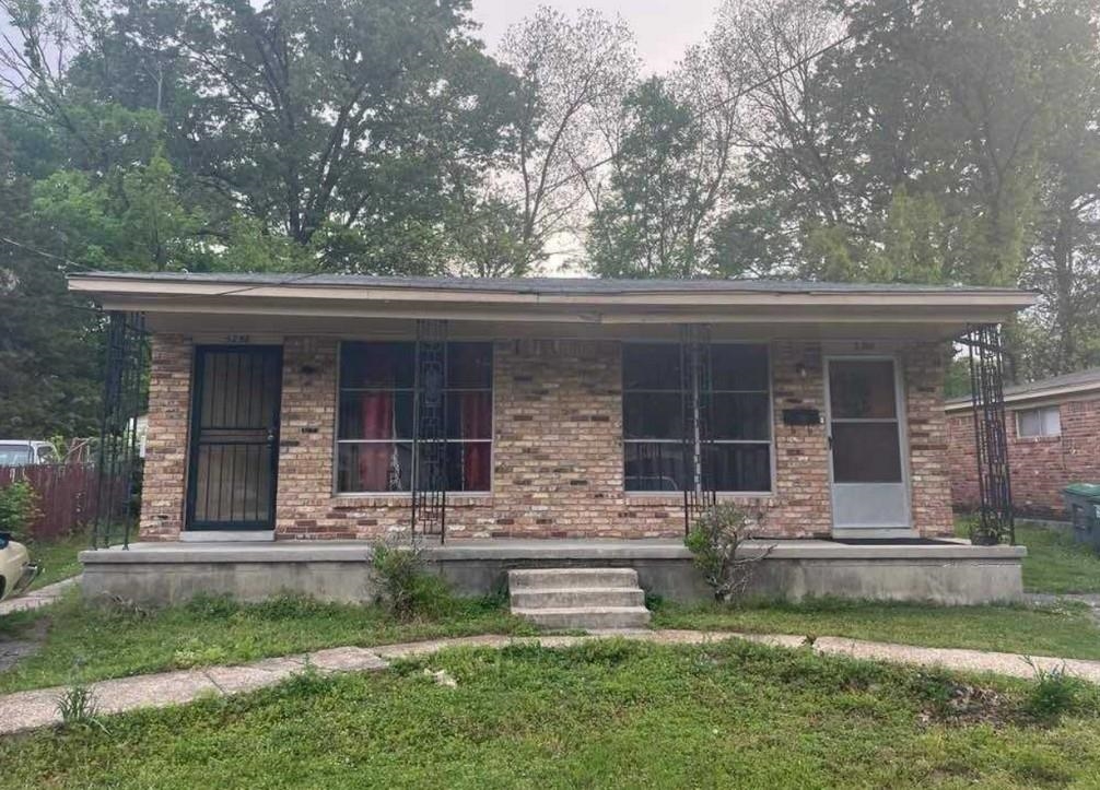 front view of house with a yard