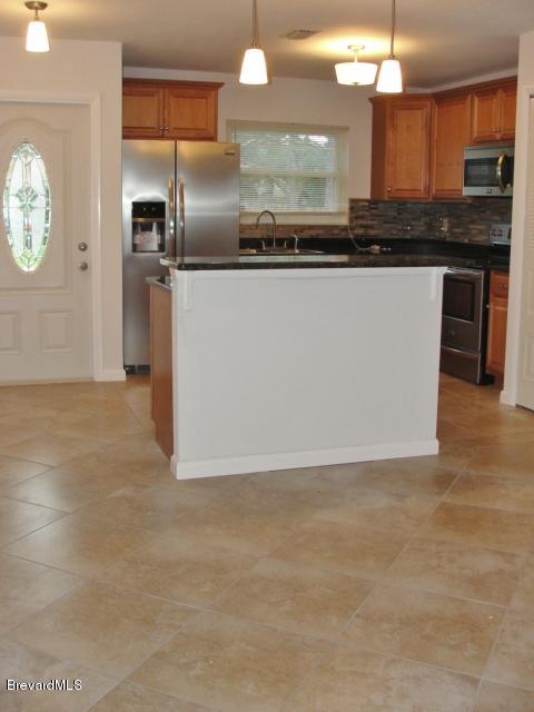 914 Cherokee Road Southeast Palm Bay, FL 32909 - Photo 11 of 36 OPen Floor Plan
