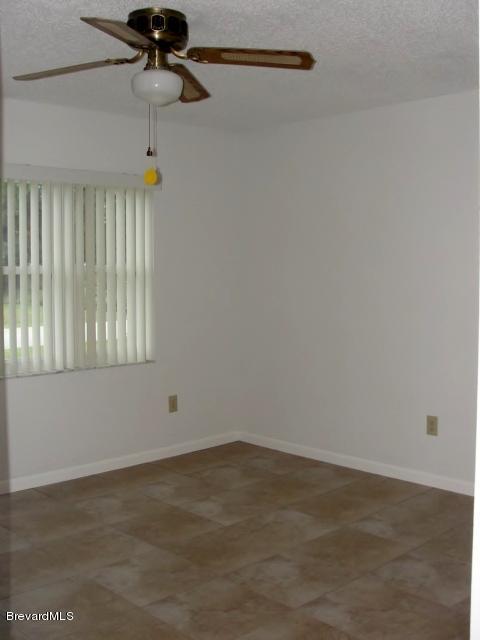 914 Cherokee Road Southeast Palm Bay, FL 32909 - Photo 20 of 36 Master bedroom